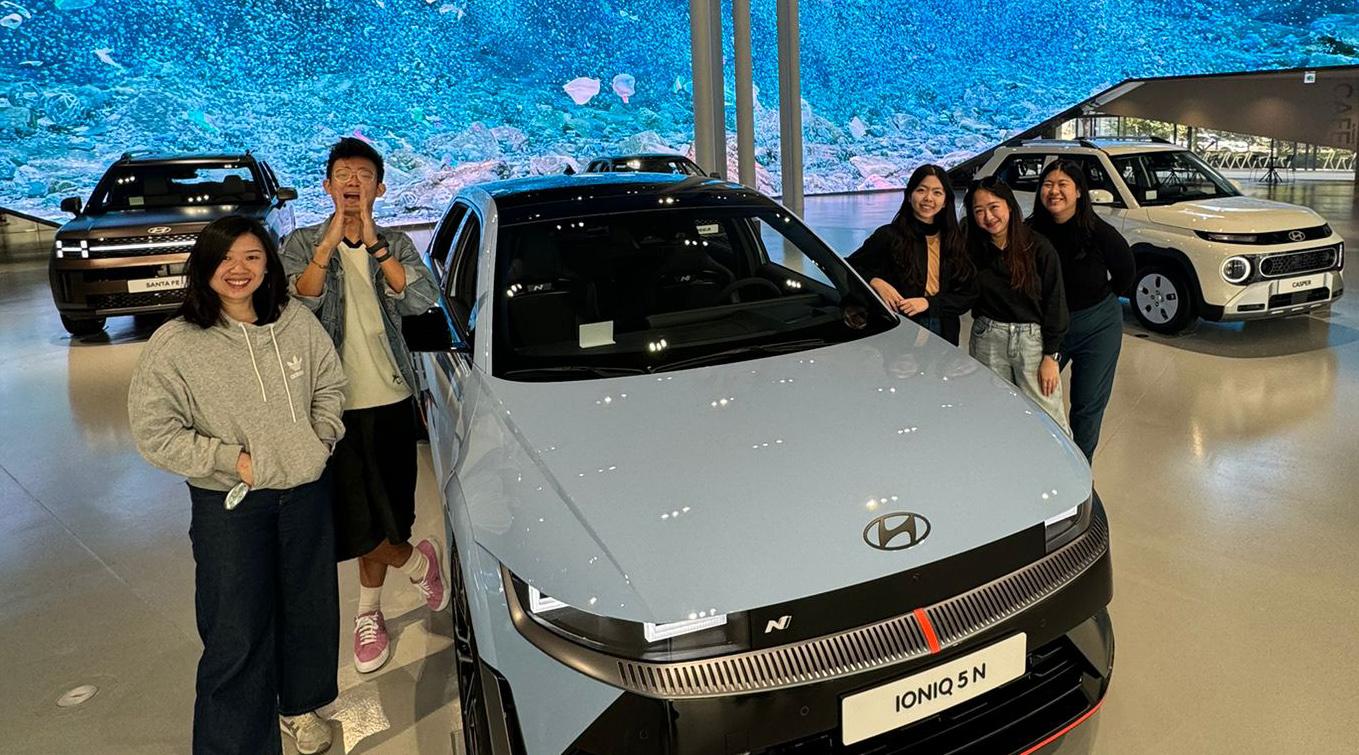 LASALLE student Ngo Quynh Phuong (third from right) at the Hyundai Motorstudio in South Korea. She is accompanied by the illustrator Toby Tan (second from left) and members of staff from the Hyundai Motor Group Innovation Center Singapore.
