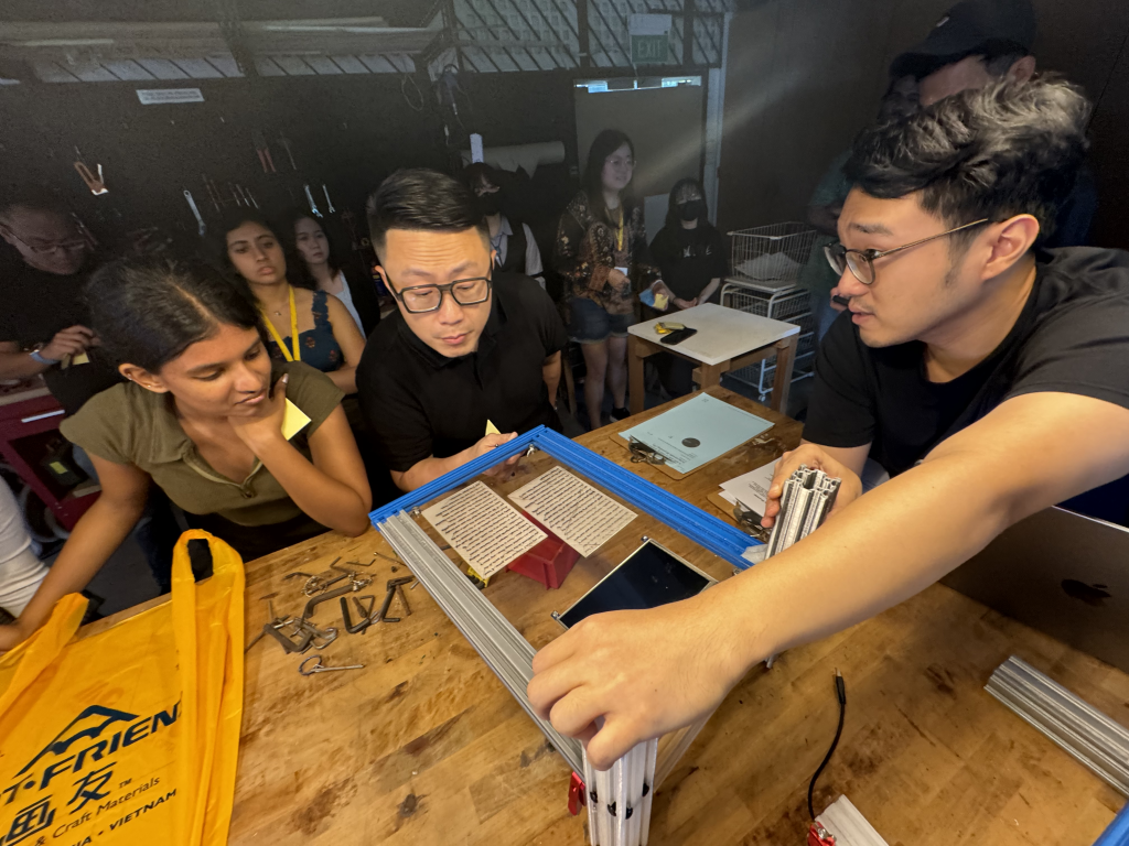 Darius presenting his work-in-progress at INTERLUDE in May 2025.