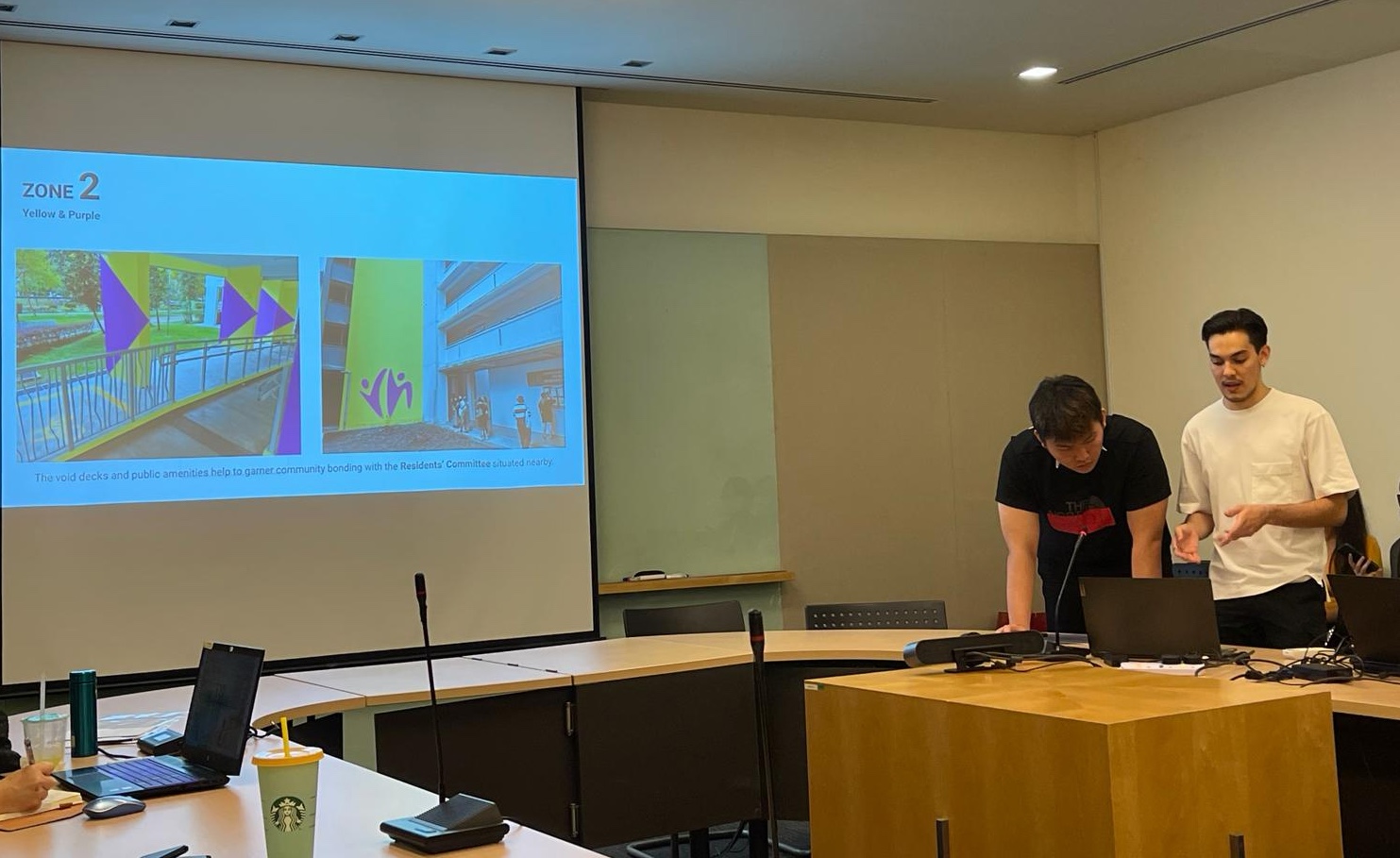 LASALLE students presenting their findings and proposals to the Holland-Bukit Timah Town Council team.